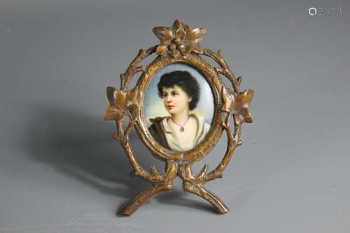 Porcelain portrait miniature, depicting a Neapolitan boy, artist marks rubbed, presented in a black forest frame, approx 6h x 5w cms