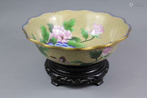 A Chinese Cloisonne bowl; the bowl flowers and birds with a fluted edge, the bowl approx 26 cms  dia x 9 cms h, on a stand