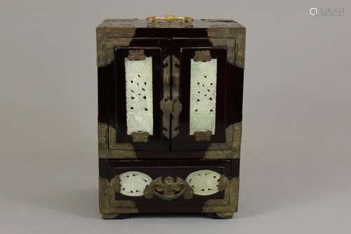 An Oriental Miniature Cabinet; the apprentice piece cabinet having inlaid carved jade panels, approx 18 x 13 x 24 cms