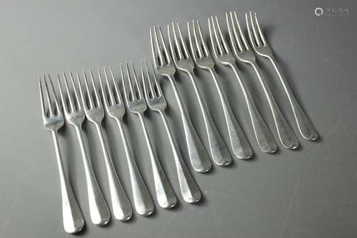 Twelve Silver Three-Tine Seafood Forks, the first three London hallmark, dated 1907, mm Mappin & Webb approx   gms, the second three London hallmark, dated 1905, mm FH together with six large silver three-tine seafood forks, London hallmark, five mm Mappin & Webb and one mm FH, approx 700 gms