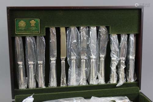 Arthur Price cutlery set, including six large forks, six small forks, six soup spoons, two serving spoons, six small knives, six large knives, one cake slice, six teaspoons, six coffee spoons, carving knife, fork and sharpener contained in the original case with guarantee together with a small quantity of large forks and cake forks