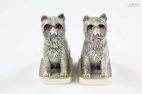 A pair of silver condiments, modelled as Highland terriers, approx 40 gms, approx 55 cms h