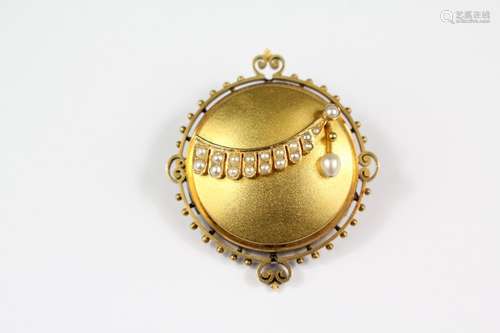 An Edwardian 14ct gold and seed pearl brooch