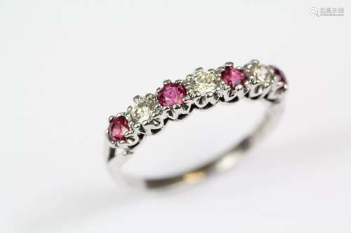 18ct white gold diamond and ruby ring, the ring set with four rubies approx 2 x 2