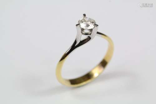 An 18ct yellow and white gold solitaire diamond ring, the diamond ring set in wishbone setting, approx 50 pts, size O, approx 2