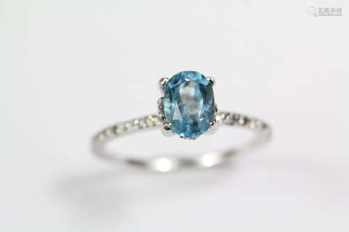 An 18ct white gold blue Topaz ring