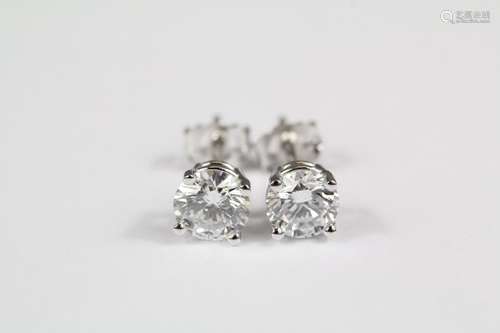 A set of 1ct platinum and diamond ear studs, 1