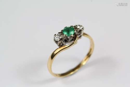 An 18ct yellow gold emerald and diamond ring, the emerald approx 3