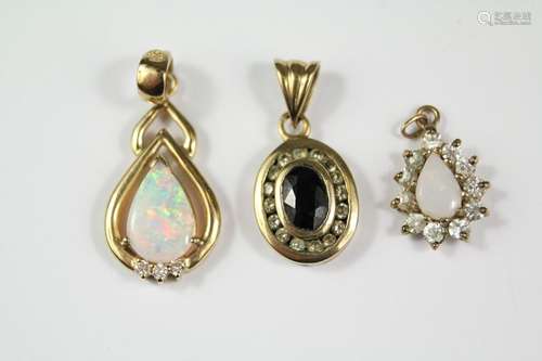 Three 9ct Gold Pendants, two opal and one sapphire, approx 3