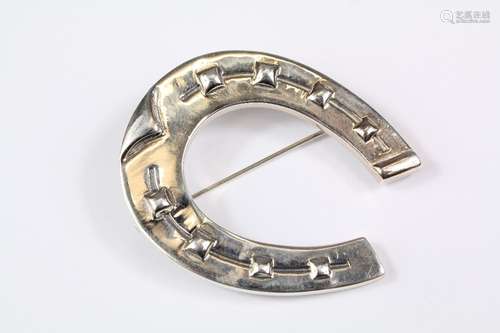 A silver horseshoe brooch, approx 14