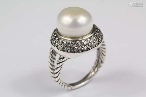 A silver and pearl dress ring, size N+, approx 8