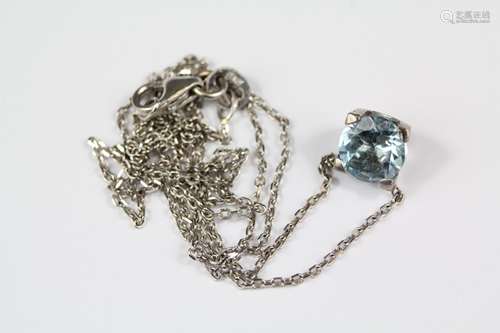 An 18ct white gold Aquamarine pendant necklace, approx 3 gms, the circular aqua approx 6mm