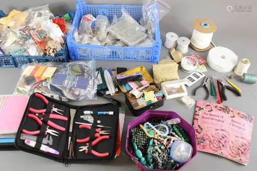 Quantity of bead stringing accessories, this lot includes a variety of beads, ropes, strings, cords and wire together with implements, a quantity of sewing bias-binding in various colours and two books entitled The Basics of Bead Stringing by Debbie Kanan, contained in a large box