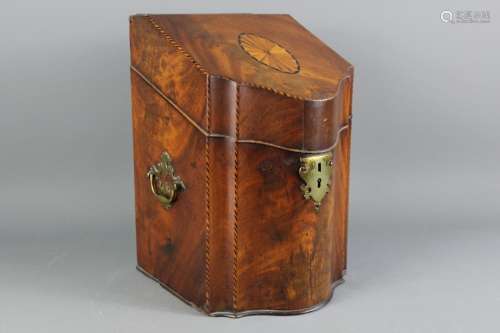 Antique Mahogany knife box; the box having brass carry handles to sides (top handle missing), hinged lid opens to reveal a fitted interior with decorative inlay, approx 23 x 23 x 34 cms