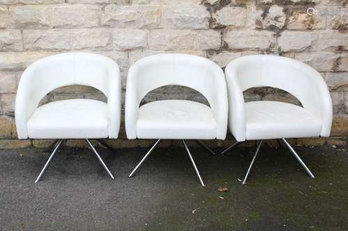 Boss Design Ltd - six white leather dining chairs in the retro style, tub design on swivel supports