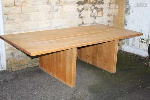 An impressive contemporary bespoke pine refectory table; approx 129 x 260 x 75 cms, supported on two plain uprights