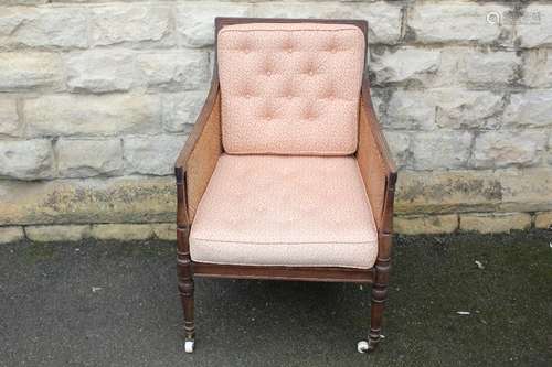 Antique Bergere Chair, with curved wood frame and turned legs, with cane back, in the Gillows style