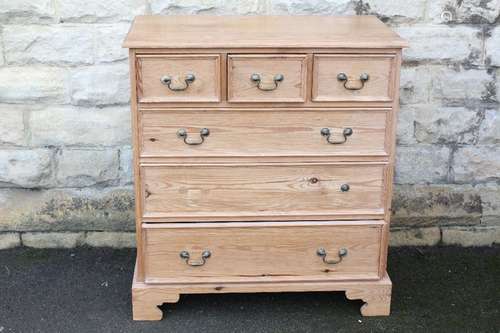 A pine chest of drawers, three short drawers and three long drawers, approx 53 x 93 x 100 cms