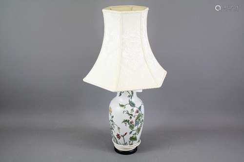 A Chinese Style Table Lamp; the lamp having hand-painted floral decoration with a cream shade, approx 62 cms h