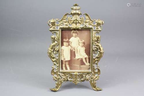 A Victorian brass photo frame, approx 18 x 28 cms