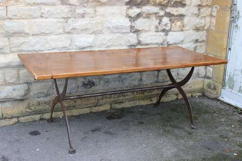 An Oak Topped Refectory Table; the table having an x-shaped support, approx 200 x 90 cms together with six dining chairs on turned legs and straight stretchers with foliate upholstery