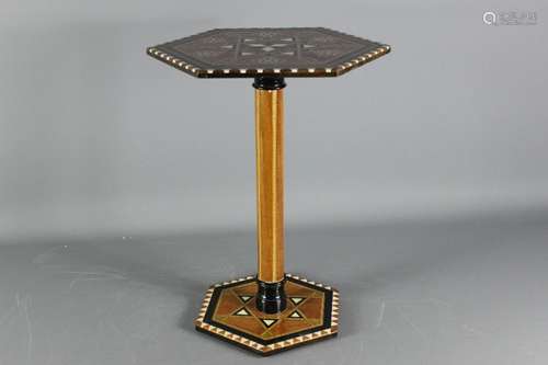 Marquetry wine table; the hexagon shaped table on central support pillar, approx 47 cms h