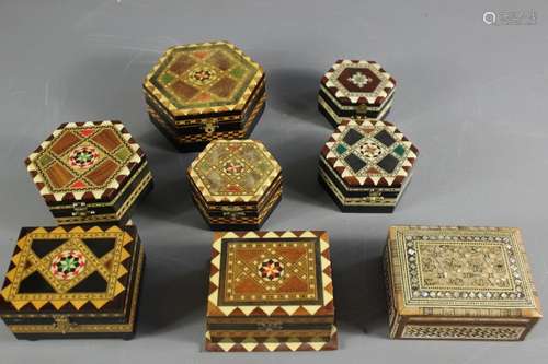 Eight marquetry boxes; some being musical boxes, some from Spain, various shapes and sizes