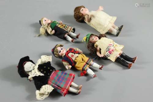 Antique miniature porcelain dolls, including a highland dancer, dutch girl, Bavarian doll and two porcelain dolls