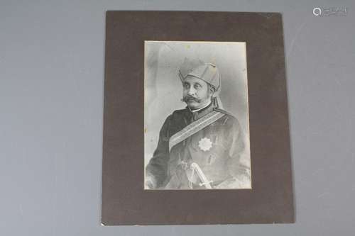 Two Vintage Prints, depicting Prime Minister of Hyderabad, Sir Asman Jah after a sepia photograph taken in 1887; the second depicting Maharajah of Benar after a sepia photograph taken in 1876, together with a brown leather album with some sepia photo-prints of Indian nobility, approx 45 images in total,  together with a sepia photograph of the 'Lodge Light of Burma No