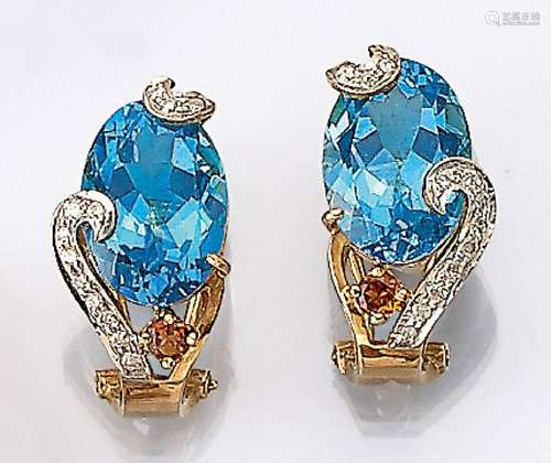 Pair of 18 kt gold ear clips with topazes, citrines and