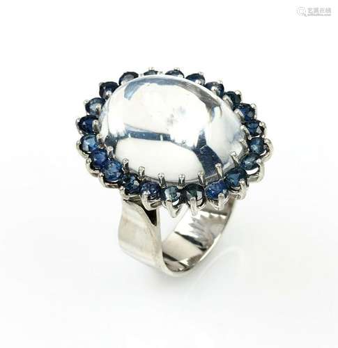 18 kt gold blossom ring with moonstone and sapphires