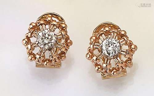 Pair of 14 kt gold clip earrings with diamonds