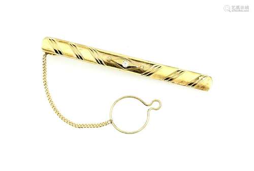 14 kt gold tie clamp with brilliant