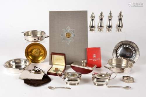 A British Empire service brass pin dish, together with a British Empire brooch, and book on the