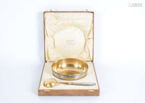 A late 19th Century silver and silver plated bowl and ladle, the bowl with a gilt interior and