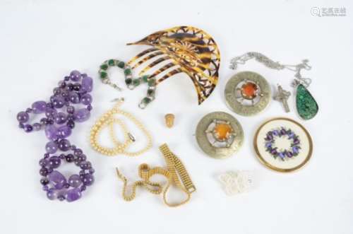 A collection of costume jewellery, consisting of brooches, earrings, pendants, pins, necklaces and