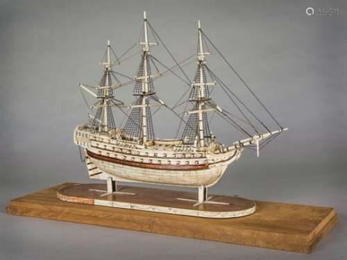A 19th Century prisoner of war style bone and wooden model of a gun ship, the well detailed three
