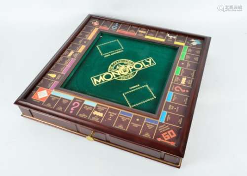 A Franklin Mint Collector's Edition Monopoly set, comes with gilt counters and hotels, vintage