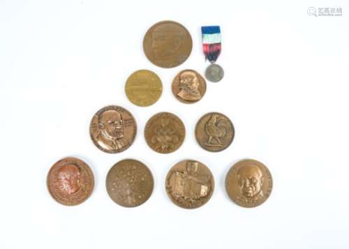 A selection of 20th Century French commemorative medallions, featuring historical figures and