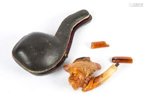 A carved 19th Century meerschaum pipe, taking the form of a Blackamoor, in original case, length