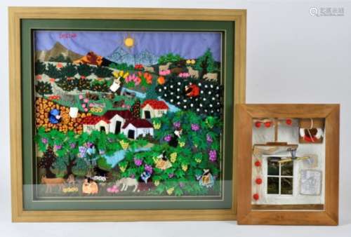 A glazed and framed feltwork and needlework, depicting an extensive landscape with vineyards and