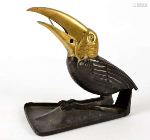 A 1920's toucan cheroot cutter, with expressive open mouth, dimensions 19cm x 19cm