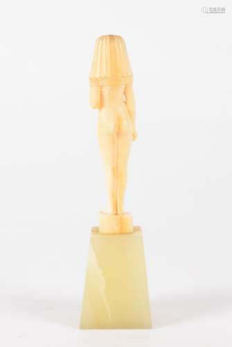 An Art Deco ivory and onyx figure, in the form of a nude female, with inspiration from the