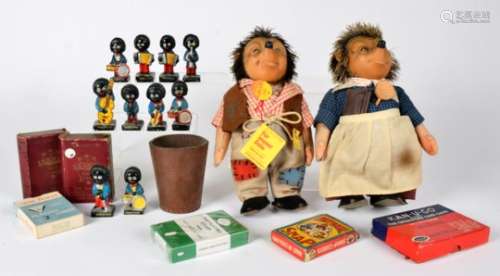 A Steiff Micki and Mrs Micki, together with a golly hand painted band group and a collection of