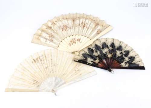 Three late 19th/early 20th Century folding fans, one with an ivory gorge and guards, satin leaf