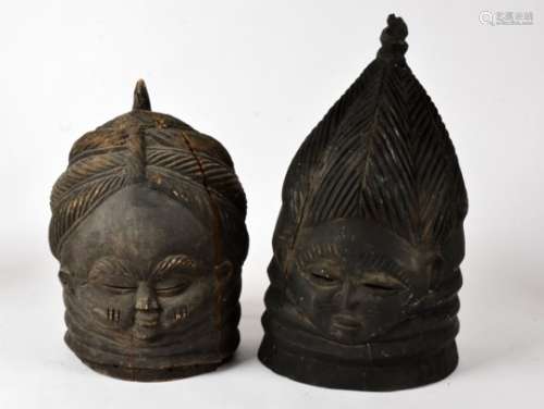 A pair of Mende Bandu helmet masks, height 43cm (2)