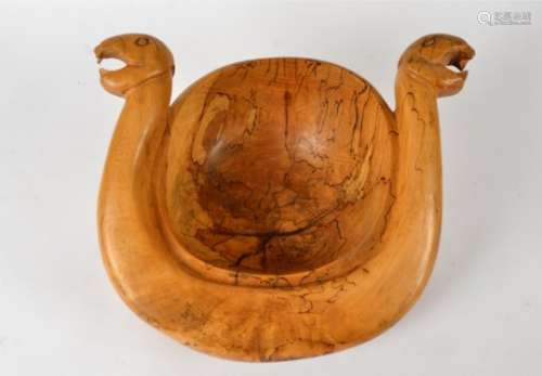 A Scandinavian wooden bowl, with two serpent heads, approximate diameter 40cm, height 22cm