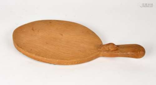A Robert Thompson of Kilburn commonly known as the Mouseman, cheese board, the oval adzed tray