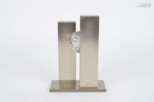 A modern brushed stainless steel limited edition desk clock by Michel Fleury c1970, of sculptural