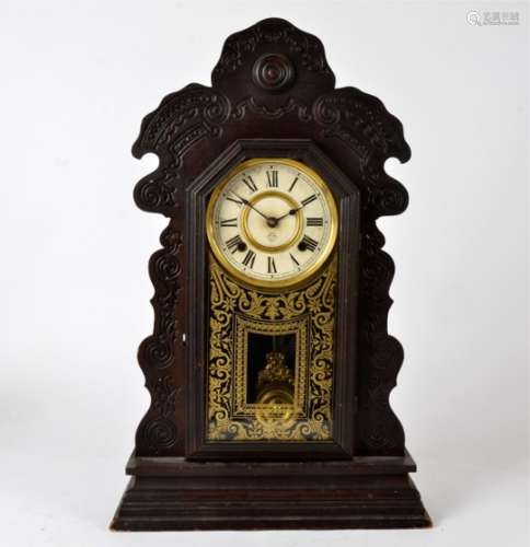 An American ginger bread surround mantle clock, marked for the 'Ansonia Clock Company Manufacturers'